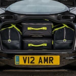 AMR Luggage – Pure Black Leather with Alcantara and Lime Accents Aston Martin Luggage Sets Aston Store 2