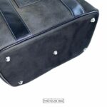 Bottom of the Aston Martin Black Leather Beauty Case