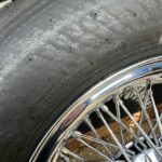 Close up of the Set of 4 Aston Martin DB6 MKII Wheels with Tyres and Spinners